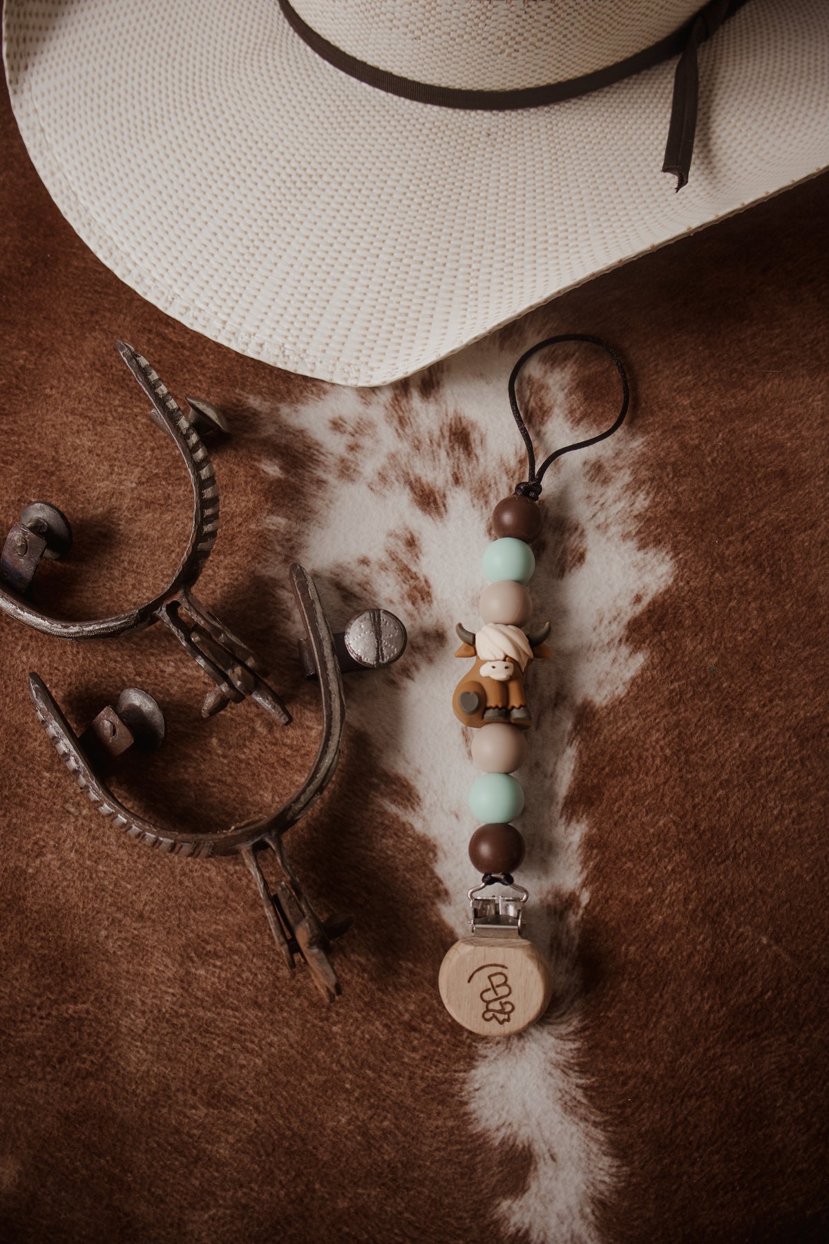 Blue Highland Cow Paci Clip